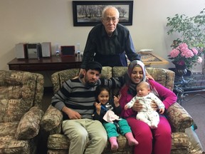 Reverend Ken Knight (in the back), donated funds to sponsor one family and the community raised the rest for Welcome Project Syria. Zaher Alchbli (seated left), daughter Abeer, wife Batoul Almussa (seated right) with baby son Hussein, have been in Goderich for just over one year.