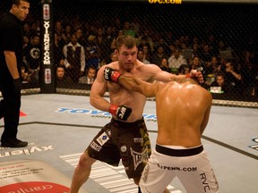 Matt Hughes pounds on B.J. Penn at UFC 63