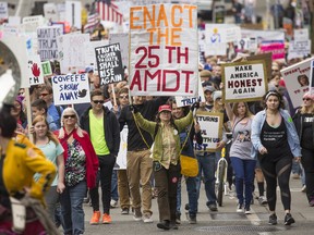 Demonstrators march through Seattle during an anti-Trump 'March for Truth' rally on June 3, 2017 in Seattle, Washington. (David Ryder/Getty Images)