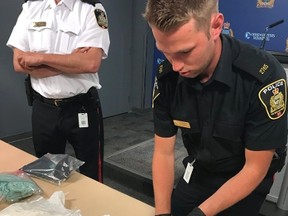 Winnipeg police spokesperson Const. Jay Murray shows off a seizure of methamphetamine during a press conference at Winnipeg police headquarters on Friday, June 16, 2017. The arrest of a 38-year-old from Selkirk with break-in instruments, a razor blade protruding from a wrapped bandage and a small amount of meth on Saturday, Aug. 27, 2017, highlights the rise of methamphetamine in Winnipeg.
Handout/Winnipeg Police Service