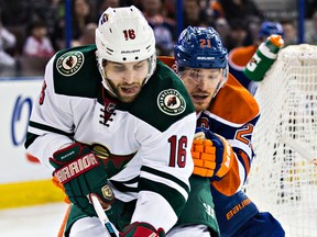 Edmonton Oilers' Andrew Ference pursues Minnesota Wild's Jason Zucker during an NHL game at Rexall Place on Jan. 27, 2015. (Codie McLachlan/Edmonton Sun)