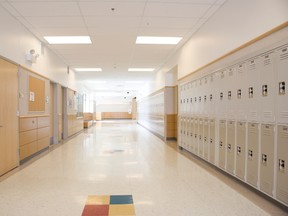 Lockers in empty high school corridor. (Getty Images)