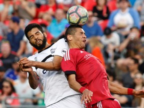 Ottawa Fury’s Onua Obasi (right) is looking for a win against his old club, the red-hot Rhinos. (Patrick Doyle/Postmedia Network)