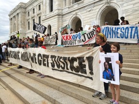 Protesters gather outside the state Capitol in St. Paul, Minn., Friday, June 16, 2017, after St. Anthony police Officer Jeronimo Yanez was cleared in the fatal shooting of Philando Castile. (AP Photo/Steve Karnowski)