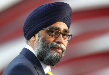 Canadian Defence Minister Hon. Harjit Singh Sajjan speaks during the third annual Breakfast on the Bridge event  on Saturday June 17, 2017 in Calgary. The event takes place every two years, at sunrise, rain or shine, on the Peace Bridge and raises funds and awareness for the Calgary Military Family Resource Centre. Jim Wells//Postmedia