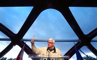 George Brookman offers a toast during the third annual Breakfast on the Bridge event  on Saturday June 17, 2017 in Calgary. The event takes place every two years, at sunrise, rain or shine, on the Peace Bridge and raises funds and awareness for the Calgary Military Family Resource Centre. Jim Wells//Postmedia