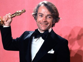 In this March 28, 1977, file photo, John G. Avildsen shows off the Oscar he won for best director for "Rocky," at the Academy Awards in Los Angeles.  (AP Photo. File)