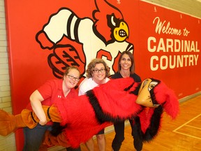 Karen Logan, left, Nicole Martin, middle, and Julie Avery, organizers of the 50th Anniversary Reunion for Lambton Kent Composite School in Dresden, Ont., posed for this fun picture with the school's mascot during the event on Saturday June 17, 2017. Ellwood Shreve/Chatham Daily News/Postmedia Network