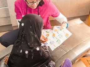 A staff member takes part in the Reflection Dental Health Centre's program to help families in Winnipeg who can't afford dental services in partnership with Give Back, Smile Back and Habitat for Humanity in June 2017. SUBMITTED PHOTO/Gaune Studios Photography