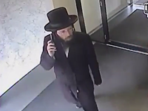 Investigators need help identifying a man dressed as an Orthodox Jew who is suspected of offering to bless women in Thornhill before sexually assaulting them. (Supplied by Toronto Police)