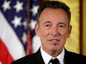 Popular music singer, songwriter and rock and roll legend Bruce Springsteen listens to his citation before being awarded the Presidential Medal of Freedom by U.S. President Barack Obama during a ceremony in the East Room of the White House November 22, 2016 in Washington, DC. (Photo by Chip Somodevilla/Getty Images)