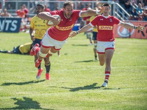 Flanker Tyler Ardon of Canada leaps in into the in-goal area before the try was called back in Saturday's test match against Romania at the Ellerslie Rugby Park. (Shaughn Butts)