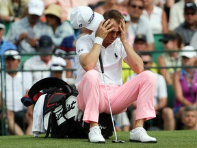 Justin Thomas waits to putt on the 18th hole during the third round of the U.S. Open Saturday, June 17, 2017, at Erin Hills in Erin, Wis. (AP Photo/David J. Phillip)