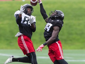 DB Imoan Claiborne breaks up a pass intended for during WR Daniel Adams during Redblacks training camp at TD Place. May 30,2017. Adams is among the players released by the Ottawa Redblacks. (Errol McGihon/Postmedia Network)