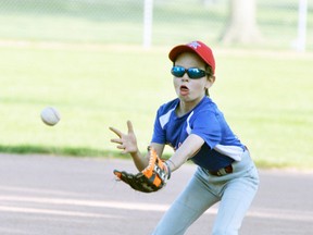 Aedan McCann of the Mitchell Major Rookie Tier 1 (Cito) baseball team concentrates on a groundball while sticking his tongue out during action against Listowel last Wednesday, June 14 at Keterson Park. The Astros lost 20-8. ANDY BADER/MITCHELL ADVOCATE