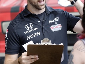 Canadian IndyCar driver James Hinchcliffe makes a promotional appearance ahead of the Honda Indy Toronto, scheduled for July 14-16, at the Exhibition GO station on June 19, 2017. (Michael Peake/Toronto Sun/Postmedia Network)