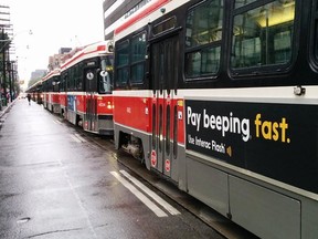 Streetcars on King St. (ERNEST DOROSZUK, Toronto Sun)