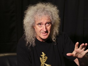 Brian May, guitarist of British rock group Queen, is considering releasing sessions between the band and David Bowie recorded in the early 1980s. (Koji Sasahara/AP Photo/Files)