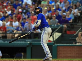 Jose Bautista of the Toronto Blue Jays hits a home run against the Texas Rangers in the fourth inning at Globe Life Park in Arlington on June 19, 2017. (Ronald Martinez/Getty Images)