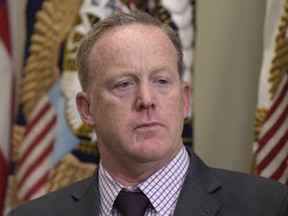 White House press secretary Sean Spicer waits for the start of an event in the Roosevelt Room of the White House in Washington on June 15, 2017. (AP Photo/Susan Walsh)