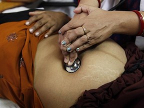 India's government is advising pregnant women to avoid all meat, eggs and lusty thoughts. Doctors say the advice is preposterous, and even dangerous, considering India's already-poor record with maternal health. (Rajesh Kumar Singh/AP Photo/Files)