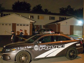 Toronto Police at a home on Burkwood Cres. in Scarborough on Monday, June 19, 2017 after two children fell out a window. (Victor Biro/Toronto Sun)