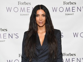 Kim Kardashian attends the 2017 Forbes Women's Summit at Spring Studios on June 13, 2017 in New York City. / AFP PHOTO / ANGELA WEISS