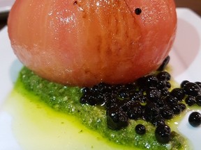 The peeled tomato may look pale, but Vaticano’s insalata Caprese is a tasty treat.