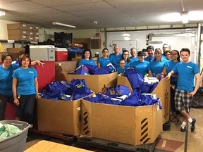 Employees of Sarnia's Express Employment Professionals gathered over a tonne-and-a-half of food for the Inn of the Good Shepherd on June 10 as part of the company's Brand It Blue Day initiative.
Handout/Sarnia This Week