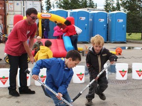 Children of all ages enjoyed playing on trampolines, bouncy castles, and street hockey during the second annual Day of Play held on Saturday, June 10.