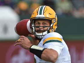 Edmonton Eskimos quarterback Mike Reilly throws a pass against the Calgary Stampeders at Commonwealth Stadium in Edmonton, June 11, 2017. (Ed Kaiser/Postmedia)