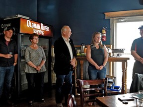 Marie Everts (right), the Town of Pincher Creek’s economic development officer, Sam Schofield (left), of Mountain Drift Photography and vice president of the chamber, and Dan Crawford (far right), president of the Rotary Club and volunteer, were all named winners of the Foothills Canada 150 Medal.