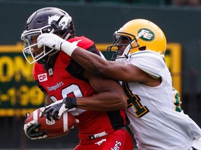 Calgary Stampeders Kamar Jorden (88) Edmonton Eskimos Brandyn Thompson (24) during first half CFL pre-season action in Edmonton, Alta., on Sunday June 11, 2017.