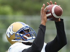 Wide receiver Kenny Stafford grabs a pass during Winnipeg Blue Bombers training camp on the University of Manitoba campus in Winnipeg on Tues., June 13, 2017.