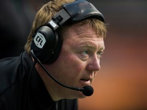 Saskatchewan Roughriders' head coach Chris Jones watches the play during a pre-season CFL game against the B.C. Lions in Vancouver on June 16, 2017. (THE CANADIAN PRESS/Darryl Dyck)