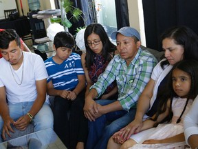 (Left to Right) Edisson Esmith Picon (23), Leonardo David Picon (17), Michael Otoniel Picon (12), Nely Arely Picon (18), Jilmar David Picon, Yolanda Duarte Martinez and Beverly Nicole Picon (6). Jilmar Picon, wife Yolanda Martinez and eldest son Edisson are being deported to Guatemala, where they fear for their lives. The other children are moving to the United States to live with a relative. Larry Wong / Postmedia