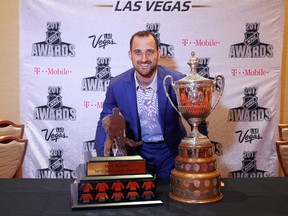 Nick Foligno of the Columbus Blue Jackets poses with the Mark Messier Leadership Award and the King Clancy Memorial Trophy during the 2017 NHL Humanitarian Awards at Encore Las Vegas on June 20, 2017 in Las Vegas, Nevada.  (Photo by Bruce Bennett/Getty Images)