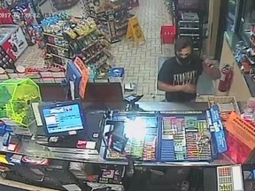 Footage of robbery at convenience store in Mt. Brydges. Supplied image.
