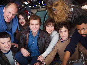 (left to right) Director Christopher Miller, Woody Harrelson, Phoebe Waller-Bridge, Alden Ehrenreich, Emilia Clarke, Joonas Suotamo as Chewbacca, director Phil Lord and Donald Glover on the set of the new Han Solo Star Wars spinoff as filming kicked off at London's Pinewood Studios earlier this year.