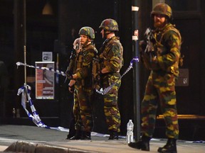 Belgian Army soldiers patrol in front of Central Station in Brussels after a reported explosion on Tuesday, June 20, 2017. (Geert Vanden Wijngaert/AP Photo)