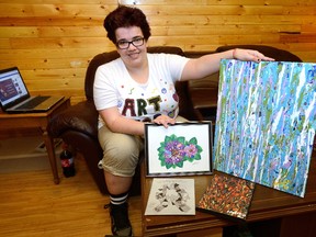 Andrea Koenig shows some of her creations that will be for sale in next week?s Art for Autism fundraiser at London?s Knollwood Park elementary school. (MORRIS LAMONT, The London Free Press)