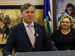 FILE PHOTO: Richard Feehan (right/Alberta Minister of Indigenous Relations) and Sarah Hoffman (left/Alberta Minister of Health), announced at the Metis Child & Family Services office in Edmonton on May 19, 2017 that new services will be available through the new Family Information Liason Units that have been set up to help support the relatives of missing and murdered indigenous women and girls. (PHOTO BY LARRY WONG/POSTMEDIA)