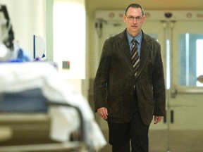 Dr. Francois Belanger walks past empty stretchers in the paramedic hall, one that not long ago would be filled with ambulance patients, at the Rockyview Hospital ER Friday June 22, 2012.