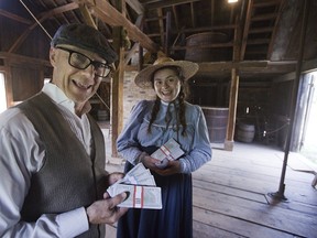 Fanshawe Pioneer Village actors Eric Harland and Lily Foris are excited that Exodus Escape Room has set up a new attraction in the village.  Participants will be challenged to complete a series of puzzles which will lead them to ransom money to pay kidnappers who have snatched the village brewmaster. (Derek Ruttan/The London Free Press)
