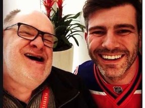 Cam Tait poses for a photo with Edmonton's mayor Don Iveson.