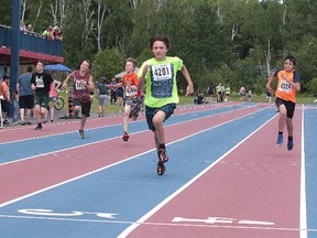 Andre Boulet of Northeastern Elementary School leads the pack during the boys 150 metre race at the R.E. Gibson Memorial Champions Meet at the Laurentian University Community Track in Sudbury, Ont. on Wednesday June 21, 2017. Gino Donato/Sudbury Star/Postmedia Network