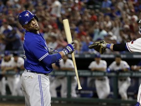 Toronto Blue Jays' Steve Pearce reacts to striking out with the bases loaded as Texas Rangers catcher Jonathan Lucroy throws the ball back to relief pitcher Jose Leclerc during the seventh inning on June 20, 2017, in Arlington, Texas. (AP Photo/Tony Gutierrez)