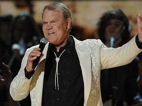 Glen Campbell performs at the Staples Center during the 54th Grammy Awards in Los Angeles, California, February 12, 2012. AFP PHOTO Robyn BECK (Photo credit should read ROBYN BECK/AFP/Getty Images)