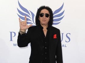 Gene Simmons flashes the  “rock on” hand gesture at the inaugural Pegasus World Cup Invitational, The World's Richest Thoroughbred Horse Race at Gulfstream Park on January 28, 2017 in Hallandale, Florida. (Gustavo Caballero/Getty Images for The Stronach Group)