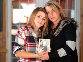 Colleen De Neve/ Calgary Herald BLAIRMORE, AB -- Cheyenne Dunbar and her mother Terry Dunbar held a photo of Cheyenne's two-year-old daughter Hailey Dunbar-Blanchette on September 17, 2015.